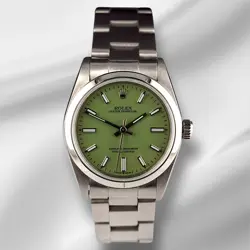 ROLEX OYSTER PERPETUAL 31MM STAINLESS STEEL PISTACHIO DIAL WATCH REF 77080