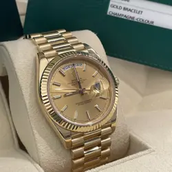 ROLEX DAY-DATE 40MM YELLOW GOLD PRESIDENTIAL CHAMPAGNE DIAL FLUTED REF: 228238