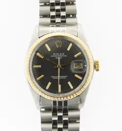 ROLEX OYSTER PERPETUAL DATE 18KT GOLD BEZEL