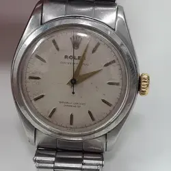 VINTAGE ROLEX OYSTER PERPETUAL 34 MM STEEL AUTOMATIC WATCH 6084 CIRCA 1953