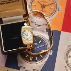 9CT GOLD ROLEX GENEVE LADIES WATCH WITH 9CT GOLD BRACELET 25 WORLD RECORD