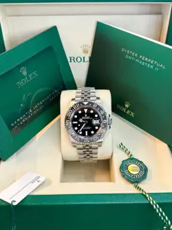 ROLEX  GMT-MASTER II - BIDIRECTIONAL ROTATABLE BLACK AND GREY BEZEL - BLACK DIAL