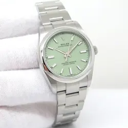ROLEX 124200 OYSTER PERPETUAL WITH PISTACHIO DIAL (NEW MODEL)
