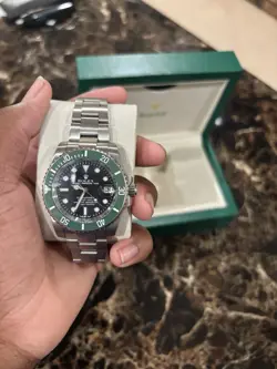 AUTHENTIC ROLEX SUBMARINER 126610LV SILVER OYSTER BRACELET WITH GREEN BEZEL