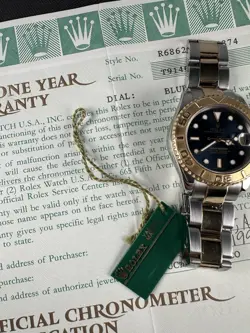 Rolex Yachtmaster 35mm 68623 Blue Dial Gold And Steel Original Papers