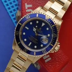 ROLEX BLUE SUBMARINER 40 MM 16618T AUTOMATIC 18K YELLOW GOLD 2003