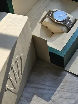 ROLEX OYSTER PERPETUAL 36MM 126000 SMOOTH BEZEL GREEN INDEX DIAL STAINLESS STEEL