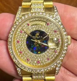 ROLEX 18K GOLD PRESIDENT DAY-DATE REF. 18238 DIAMOND AND RUBY STUDDED