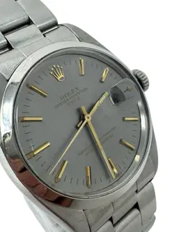 ROLEX OYSTER PERPETUAL DATE REF. 1500 - GREY SUNBURST DIAL