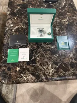 AUTHENTIC ROLEX SUBMARINER 11610LV SILVER OYSTER BRACELET WITH GREEN BEZEL