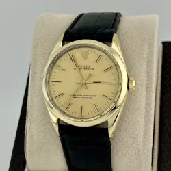 ROLEX OYSTER PERPETUAL 1024 YELLOW GOLD STEEL CHAMPAGNE DIAL LEATHER STRAP
