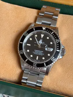 ROLEX SUBMARINER 168000 SILVER OYSTER BRACELET WITH BLACK BEZEL WITH BOX