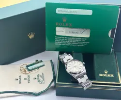 ROLEX OYSTER PERPETUAL WITH BOX AND PAPERS STAINLESS STEAL
