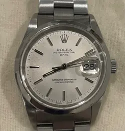 ROLEX OYSTER PERPETUAL DATE SILVER DIAL 34MM REFERENCE 15200