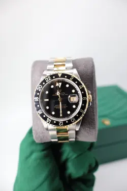 ROLEX GMT-MASTER II 16713 BLACK DIAL TWO-TONE OYSTER