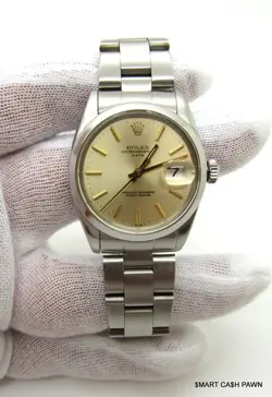 ROLEX OYSTER PERPETUAL DATE REF 1500 34MM AUTO UNISEX CHAMPAGNE WRISTWATCH