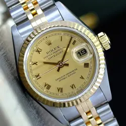 ROLEX DATEJUST WOMENS TWO-TONE WATCH 18KY & STEEL CHAMPAGNE ROMAN JUBILEE 69173