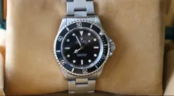 ROLEX SUBMARINER 14060 STAINLESS STEEL OYSTER BRACELET WITH BLACK BEZEL
