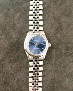 1973 VINTAGE ROLEX OYSTER PERPETUAL REF. 1002 - BLUE METALLIC DIAL