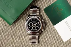 ROLEX COSMOGRAPH DAYTONA REF. 116520 “STEEL, BLACK DIAL, RSC WARRANTY”