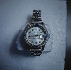 DIAMOND/SAPPHIRE BEZEL WITH