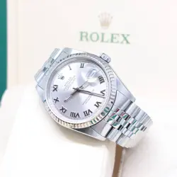 ROLEX 36MM OYSTER PERPETUAL RHODIUM ROMAN DIAL DATEJUST REF: 16234 (F SERIES)