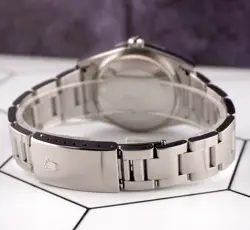 Rolex 34mm Oyster Perpetual Baby Blue Diamond Dial Engine Turned Watch 14010