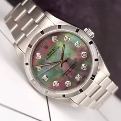 Rolex 34mm Oyster Perpetual Black Mop Diamond Dial Engine Turned Watch 14010