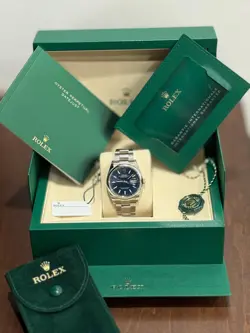 ROLEX DATEJUST 2025 BLUE INDEX DIAL STAINLESS SMOOTH BEZEL OYSTER