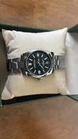 PERPETUAL BLACK DIAL