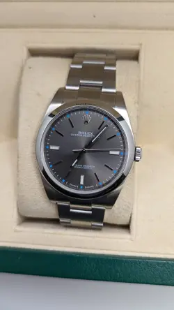 ROLEX OYSTER PERPETUAL 114300 STAINLESS STEEL AUTOMATIC WATCH - 39MM BOX