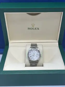 ROLEX DATE 15200 SILVER OYSTER BRACELET WITH SMOOTH BEZEL 34MM ROLEX BOX