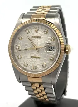 PRE-OWNED ROLEX DATEJUST 36MM SILVER JUBILEE DIAL - 16233- Y GOLD/SS, S108444