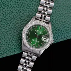 ROLEX DATEJUST LADIES STAINLESS STEEL GREEN ROMAN DIAMOND BEZEL 0.90CTS WATCH