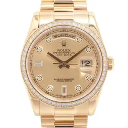ROLEX DAY-DATE 118348A YG YG AT CHAMPAGNE-FACE