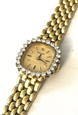 LADIES 18K YELLOW GOLD CELLINI ROLEX DIAMOND BEZEL WATCH