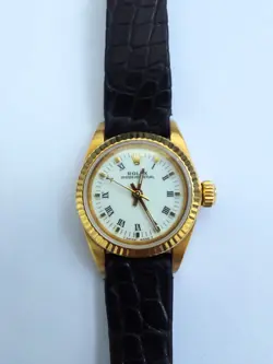 ROLEX OYSTER PERPETUAL LADIES LEATHER STRAP YELLOW GOLD WATCH