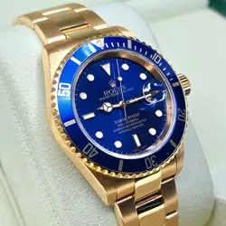 ROLEX SUBMARINER DATE, 18K YELLOW GOLD WITH BLUE DIAL, CIRCA 2002