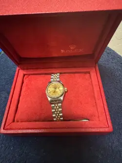 WITH CHAMPAGNE BEZEL