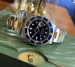 ROLEX SUBMARINER 16613 SILVER AND GOLD OYSTER BRACELET WITH BLUE BEZEL MFG 2007