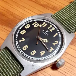 ROLEX MILITARY VINTAGE WATCH, VIETNAM WAR ERA, HAND-ROLLED BLACK DIAL