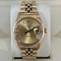 ROLEX OYSTER PERPETUAL DATE 34 JUBILEE FLUTED BEZEL 18K GOLD CHAMPAGNE DIAL 1981