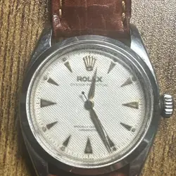 RARE VINTAGE ROLEX 6564 AUTOMATIC OYSTER PERPETUAL WATCH WAFFLE DIAL 1956.