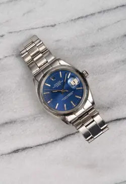 Vintage Rolex Oyster Perpetual Date 70s Ref 1500 Blue Dial 34mm Case.
