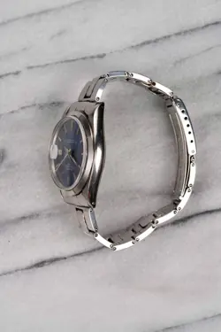 Vintage Rolex Oyster Perpetual Date 70s Ref 1500 Blue Dial 34mm Case.