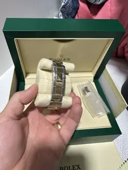ROLEX SUBMARINER 16613 SILVER AND GOLD OYSTER BRACELET WITH BLACK BEZEL