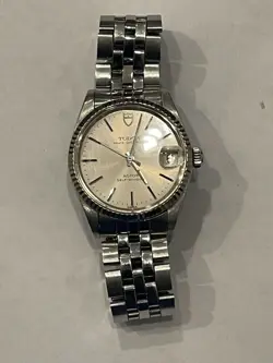 AUTOMATIC WATCH AND