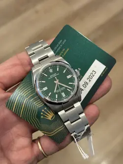 ROLEX OYSTER PERPETUAL 126000 SILVER OYSTER BRACELET WITH SILVER BEZEL