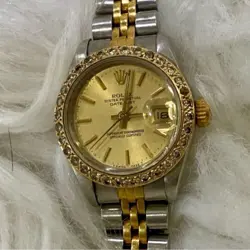 WOMEN’S ROLEX DATEJUST STAINLESS STEEL AND GOLD WATCH WITH DIAMOND BEZEL