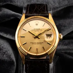 1971 ROLEX OYSTER PERPETUAL DATE 18K GOLD 34MM CHAMPAGNE DIAL WATCH, REF. 1503